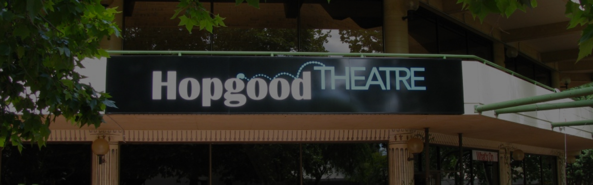 The sign on the front of the Hopgood Theatre, styled to look as though the word Theatre has hopped over the word Hopgood